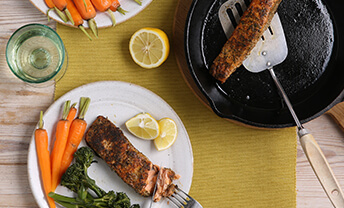 Serve up salmon fillets marinated with orange and basil