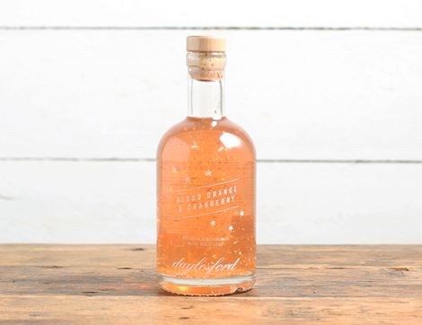 blood orange & cranberry gin with gold leaf daylesford