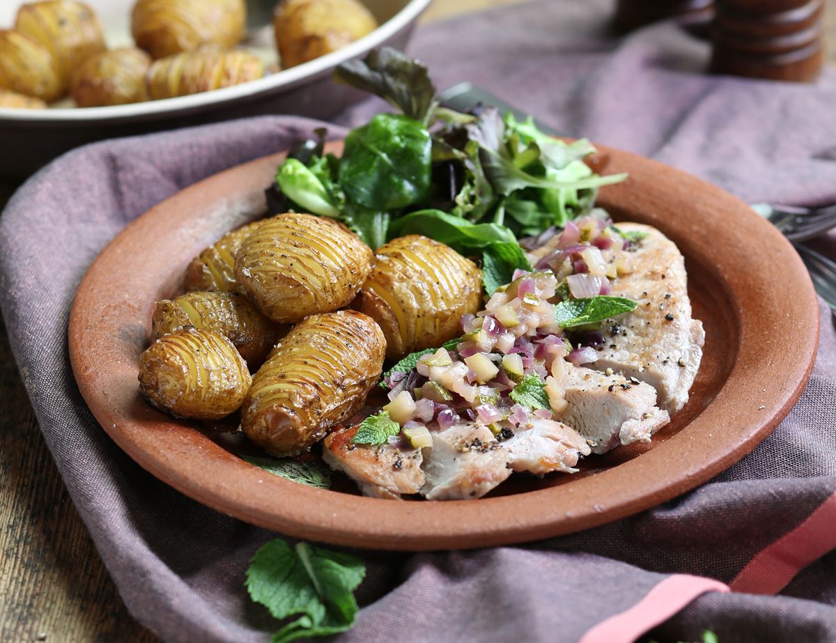 Pork Steaks with Hasselback Potatoes & Courgette Chutney