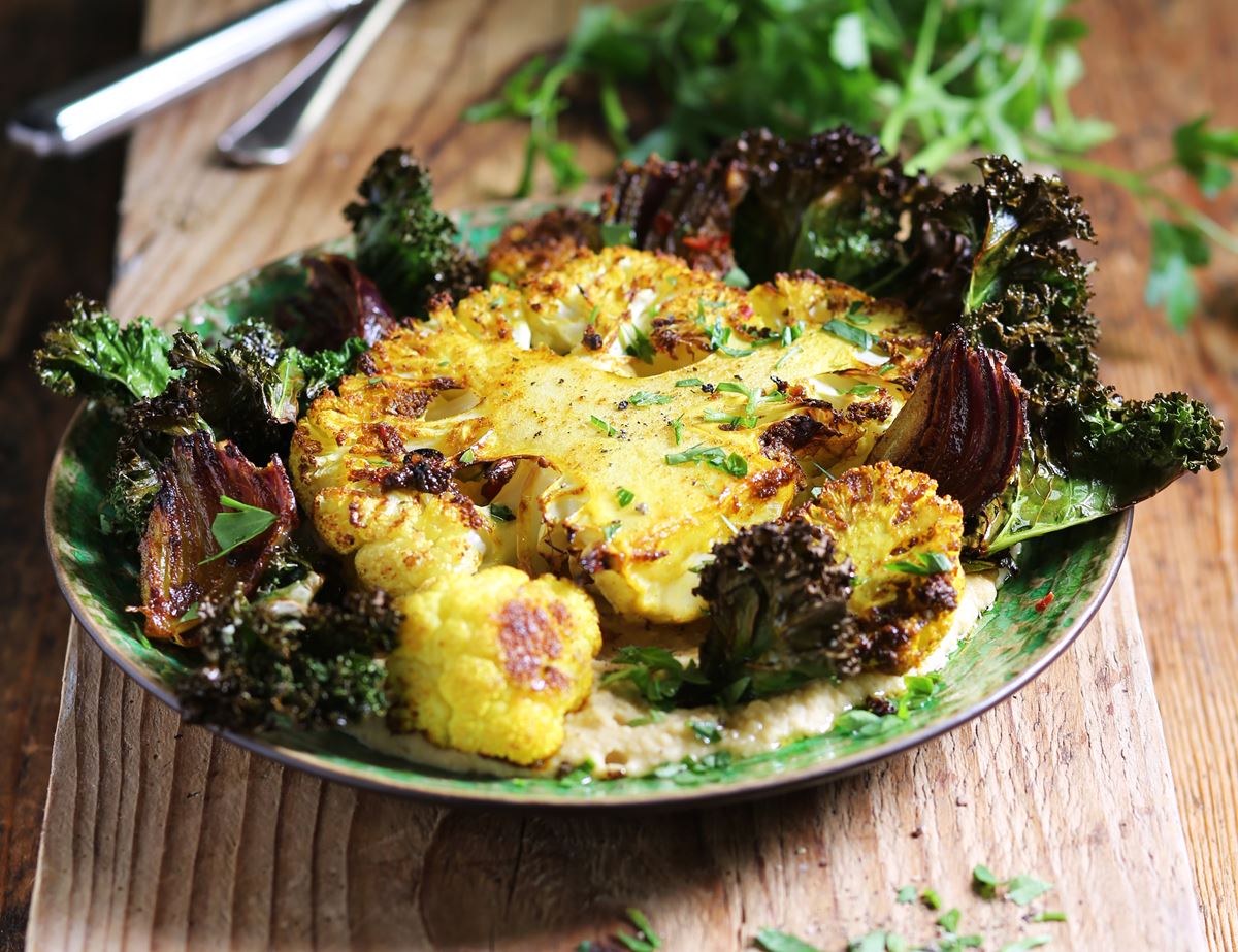 Spiced Cauliflower Steaks with Warm Houmous & Crispy Kale