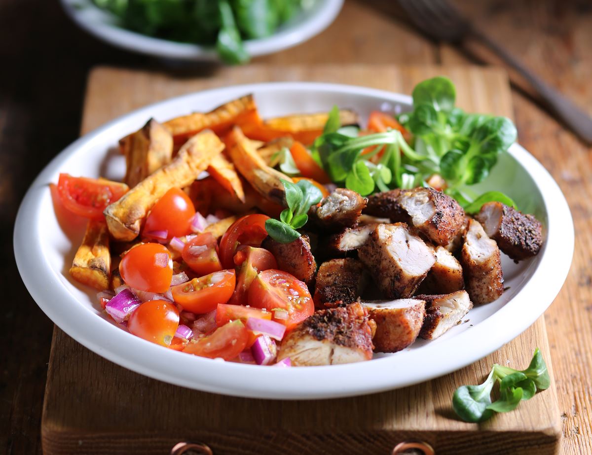 Jerked Chicken with Sweet Potato Fries & Tomato Salad