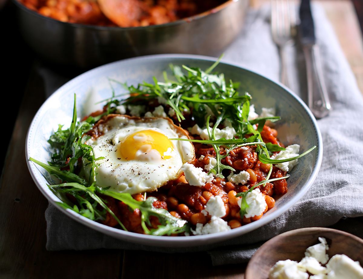 Smoky Haricot Bean Stew with Lardons, Crispy Eggs & Feta