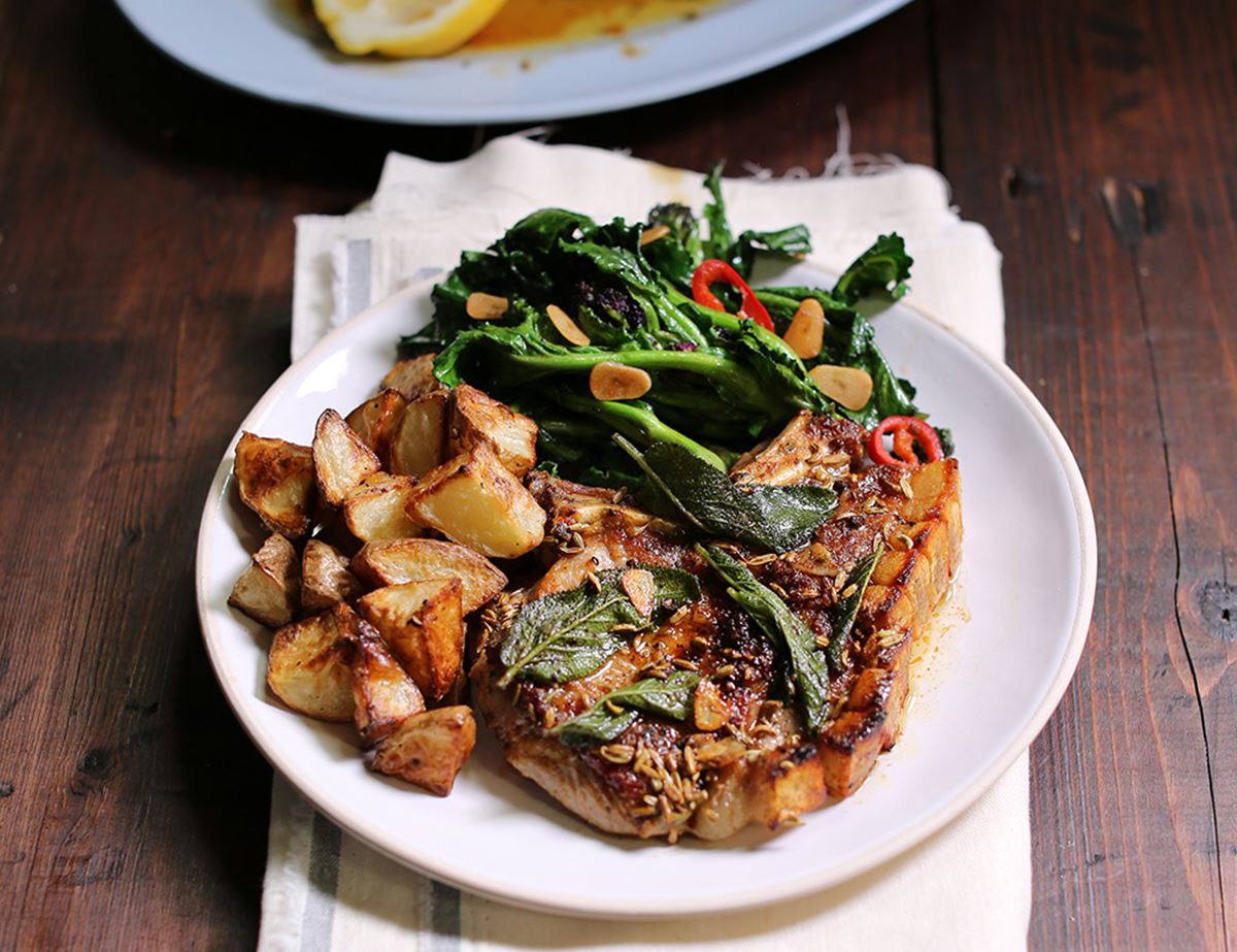 Speedy Sage & Butter Pork Chops with Roast Potatoes Recipe | Abel & Cole