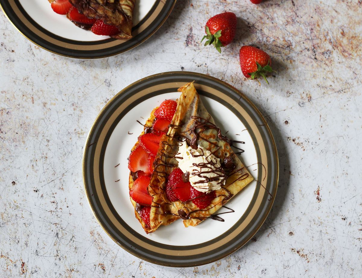 Sweet Crêpes with Strawberries, Hazelnut Chocolate Spread & Cream